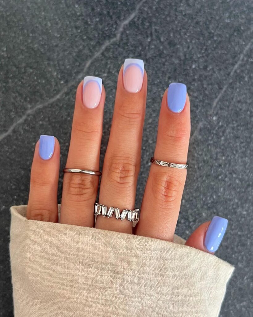 Periwinkle blue nails with white French tip accent