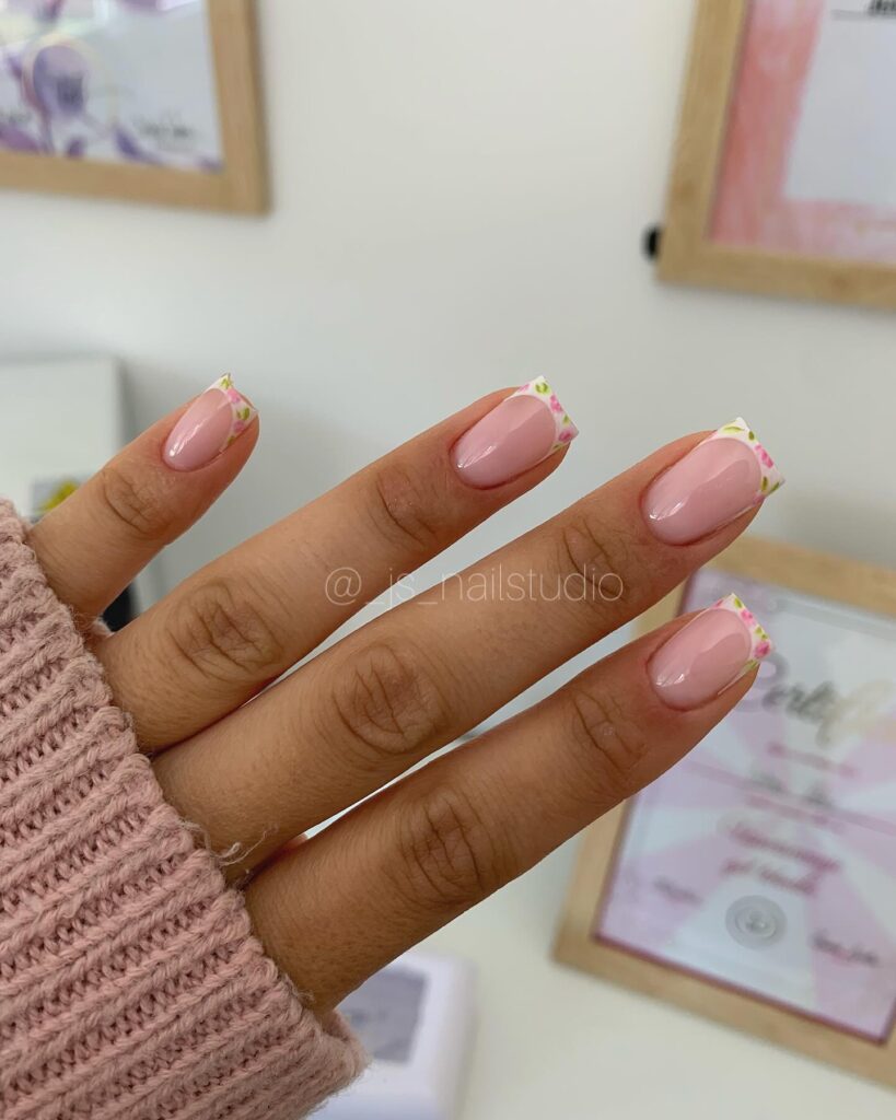 pink French tips with white floral art