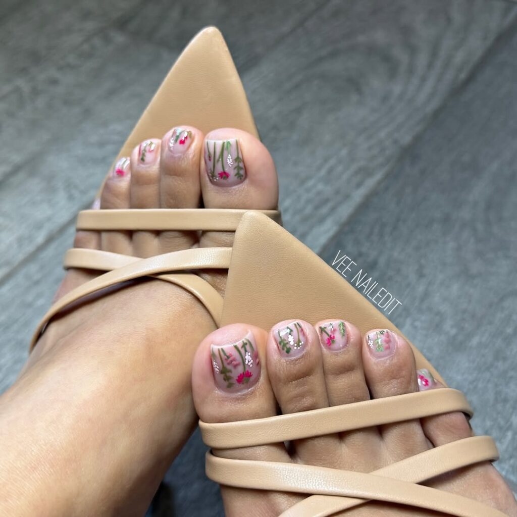 nude spring pedicure with micro botanical floral art