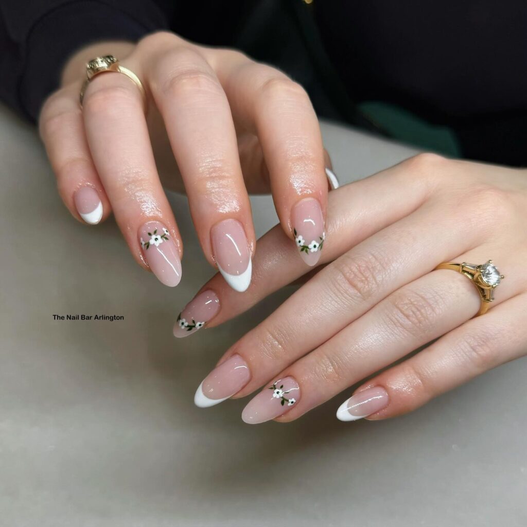 white French tips with floral vine details
