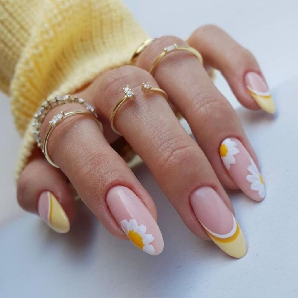 yellow swirl French tips with oversized daisies