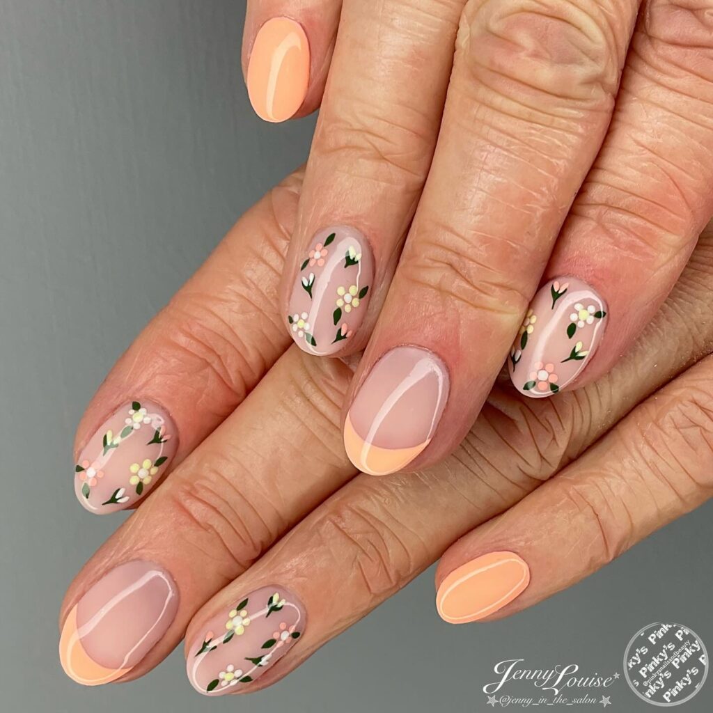Peach coral French tips with sheer floral nails