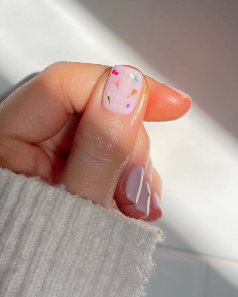 Lilac nails with dried flower charm art