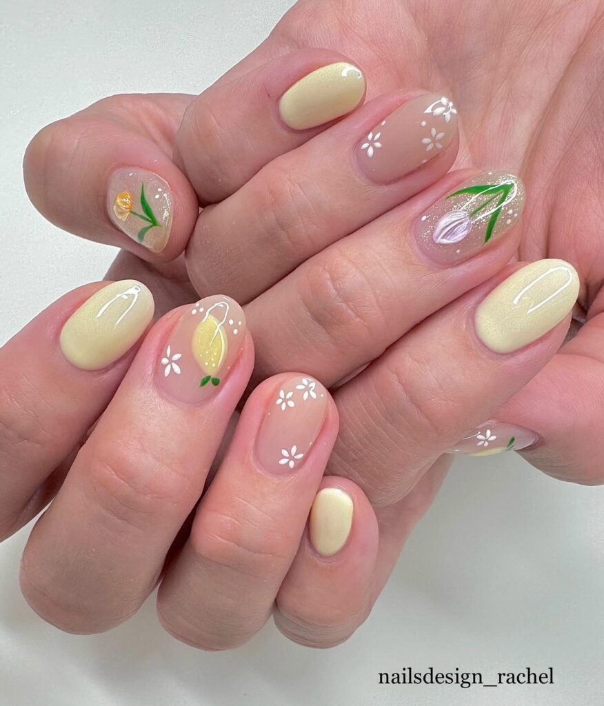 Yellow nails with hand-painted tulip and floral art