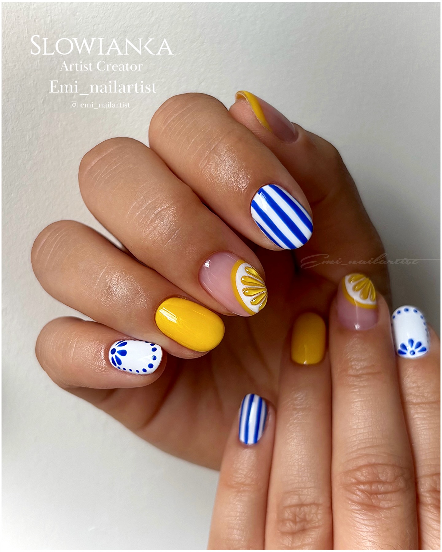 Yellow and white nails with lemon and blue Amalfi tile art