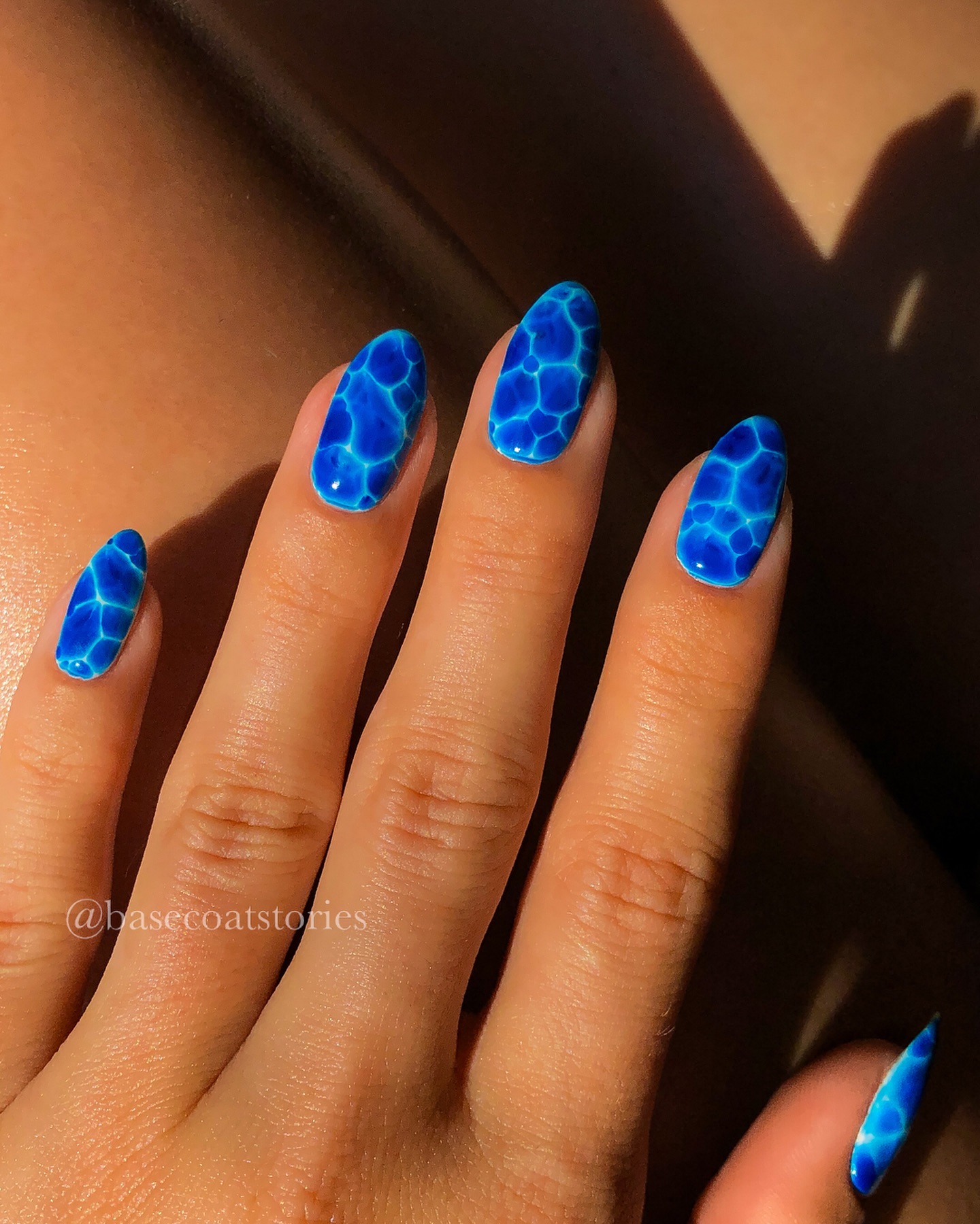 Blue and white abstract floral nail art