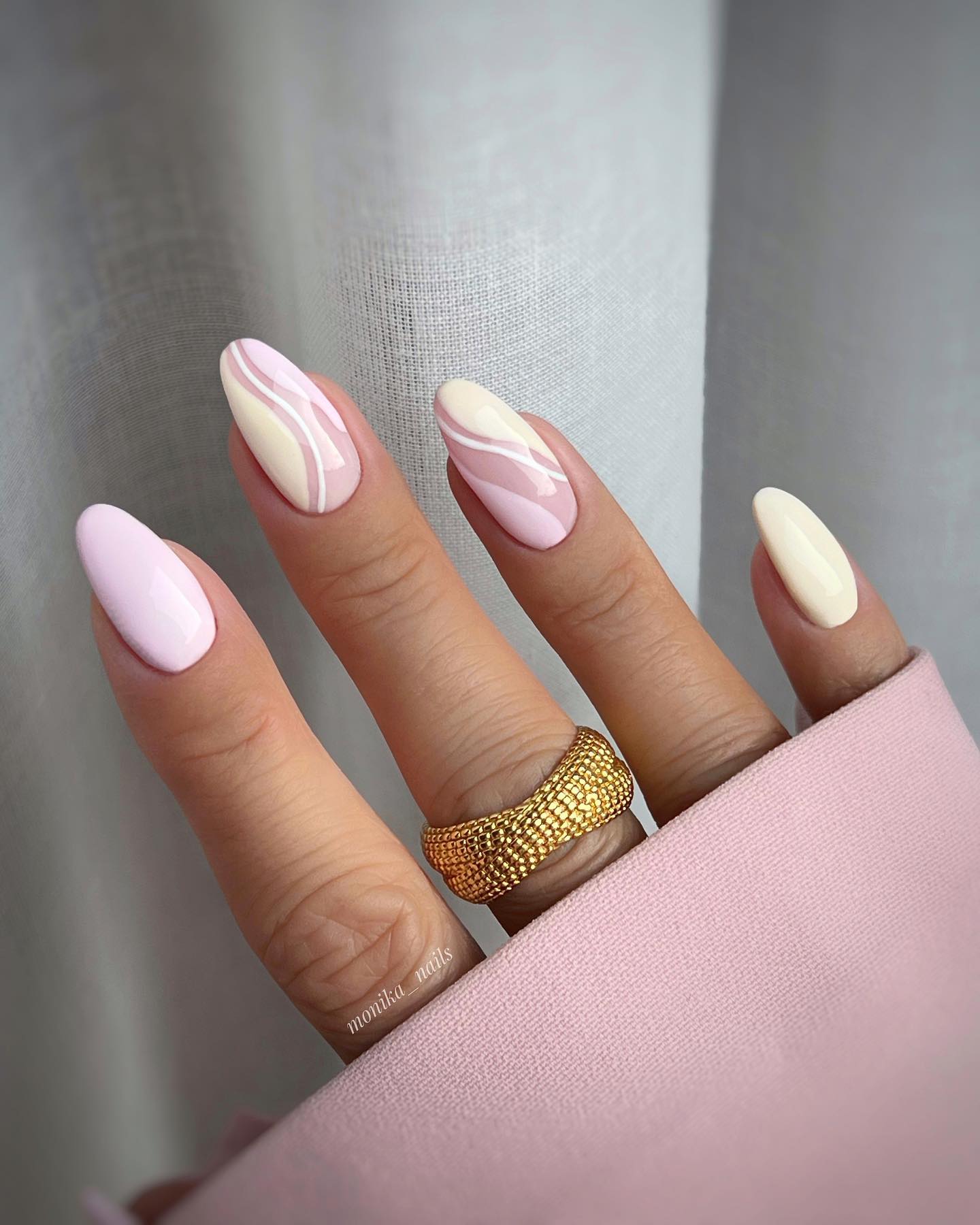 Blush pink and cream swirl wave nails