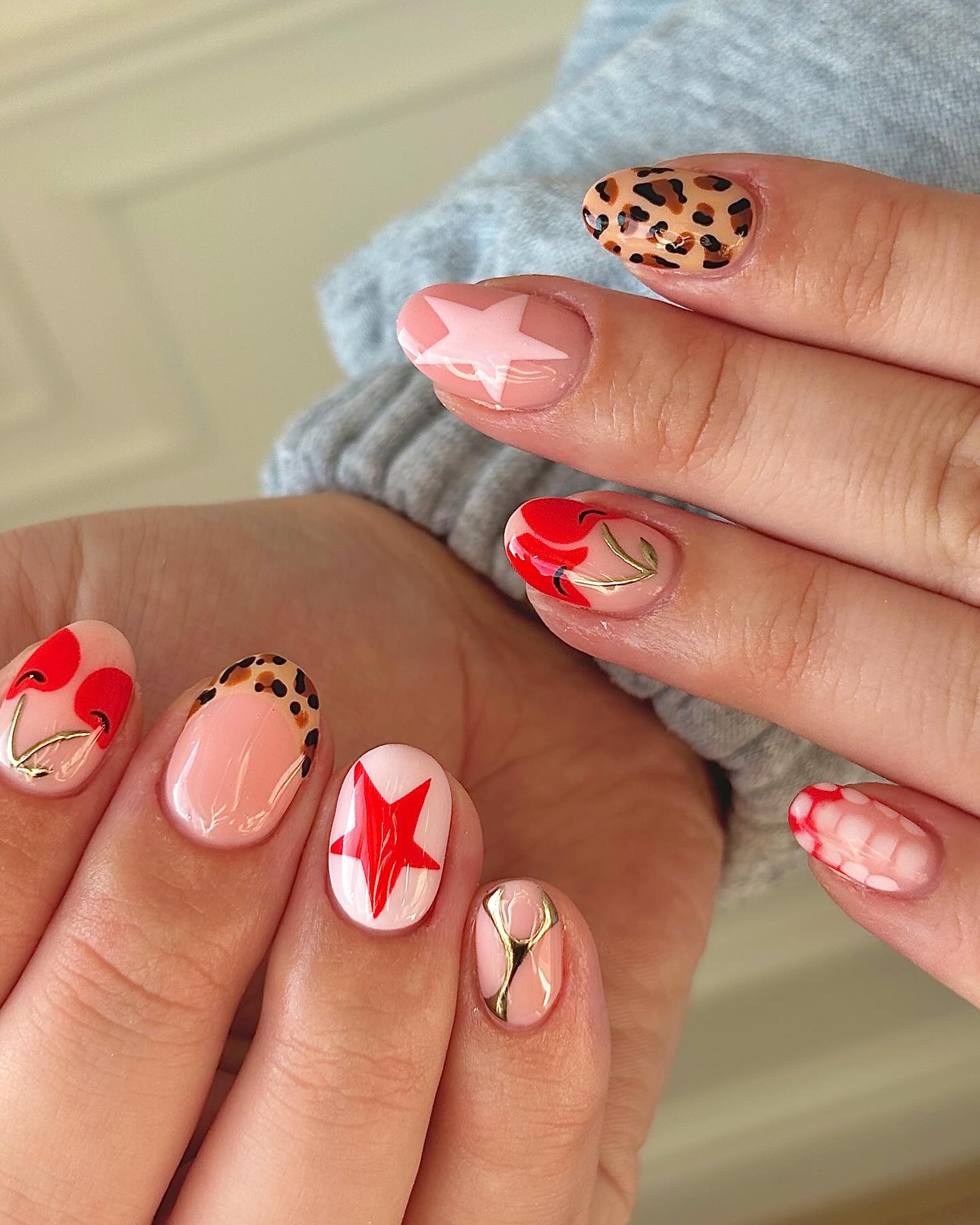 Cherry leopard print and red star nail art mix