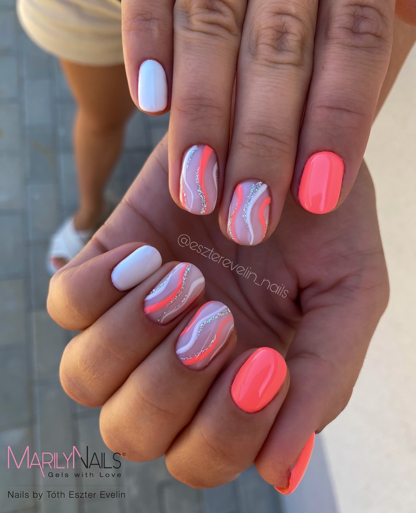 Coral swirl glitter nails