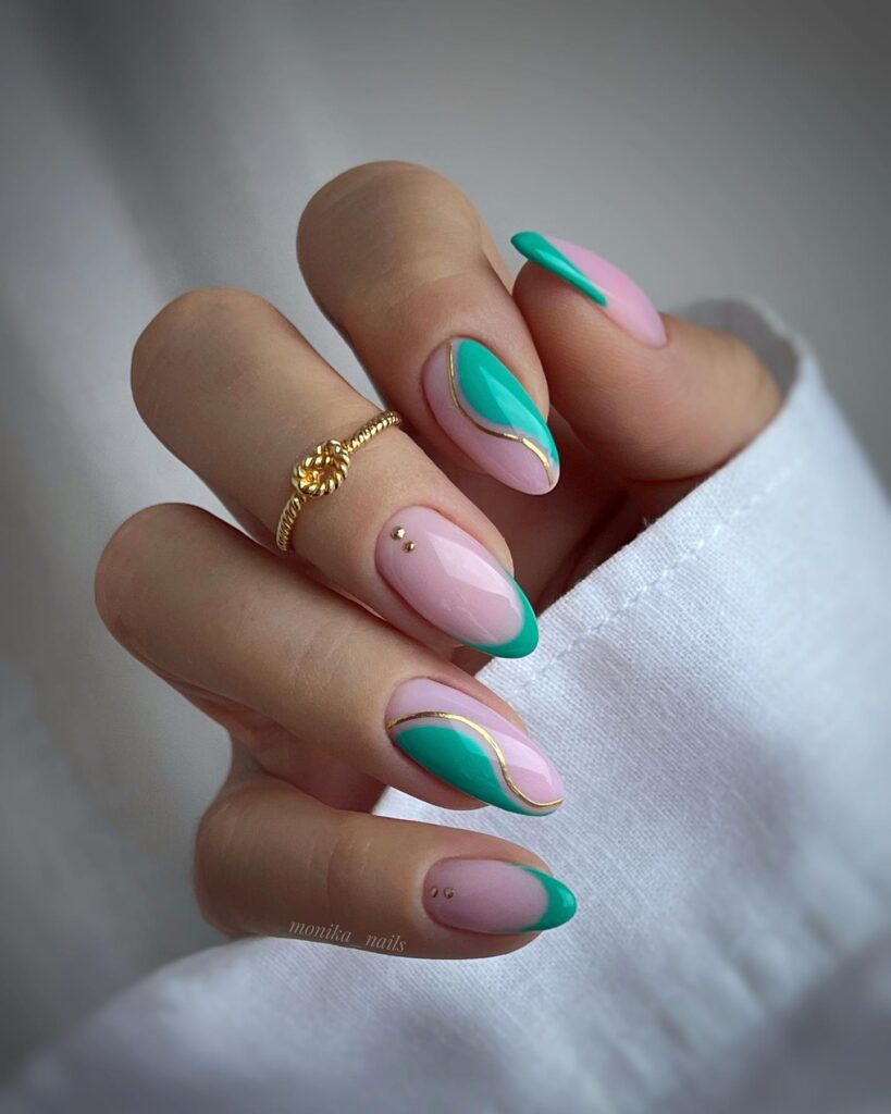 Long almond nails with teal green and soft pink abstract nail art with gold line accents
