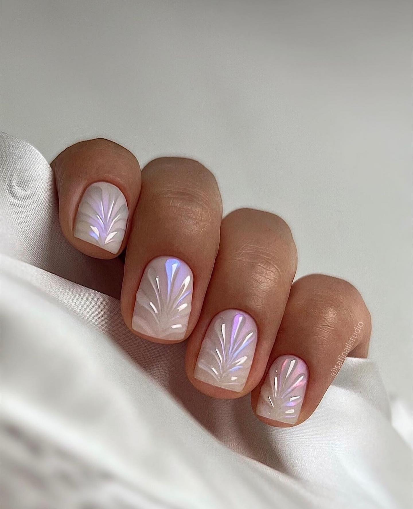 Iridescent white fan nails