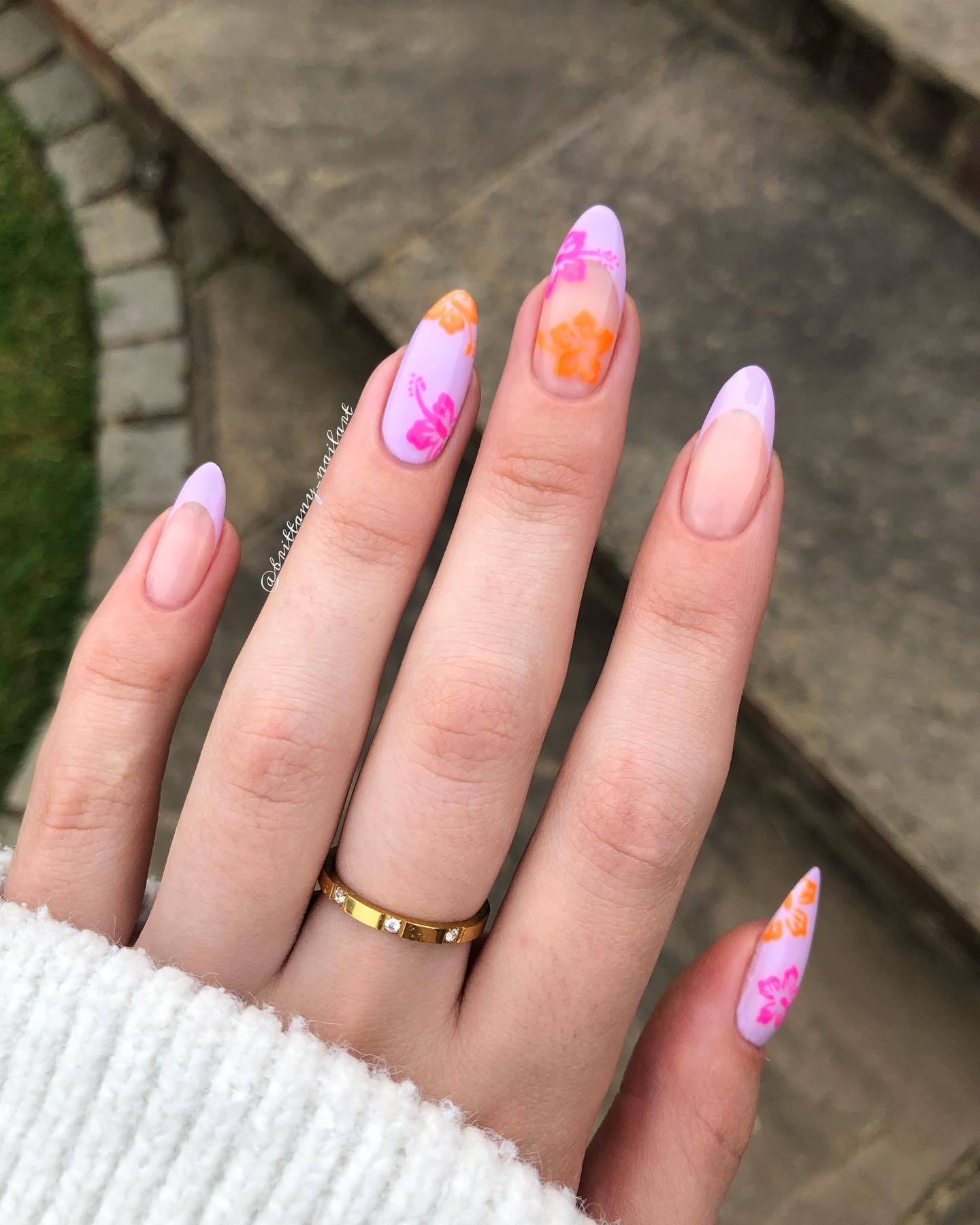 Lavender almond nails with hot pink and orange hibiscus flowers