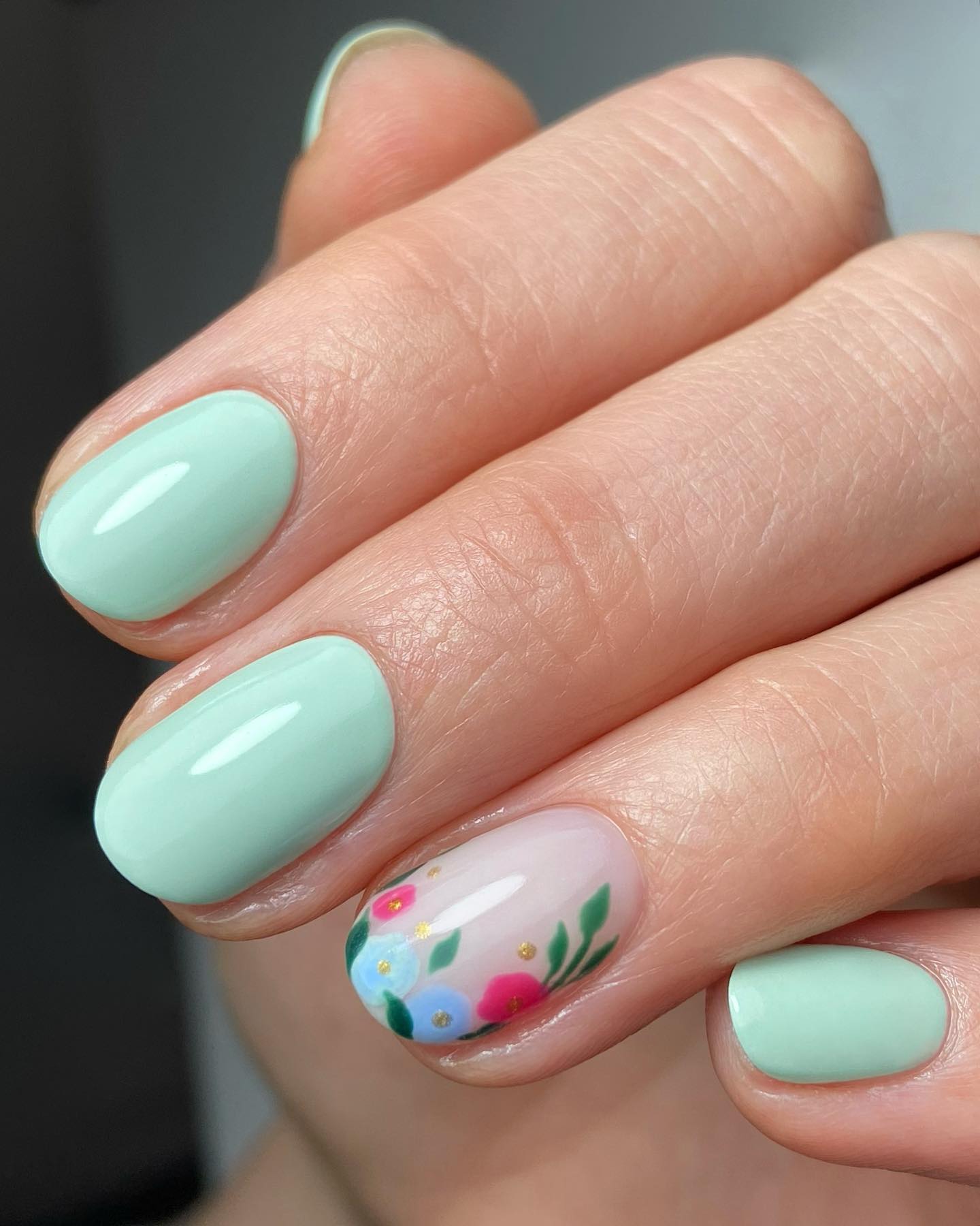 Mint green floral accent nails