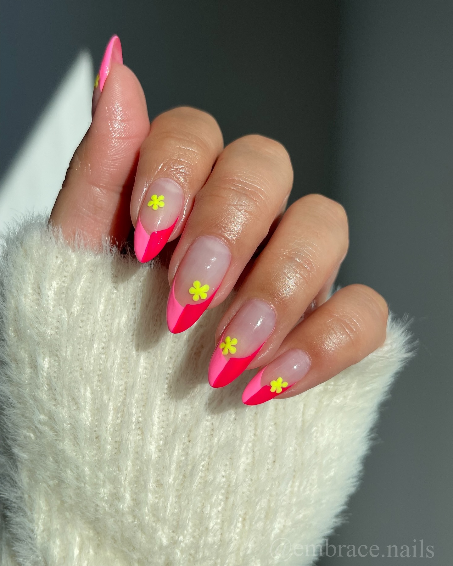 Neon pink stiletto nails