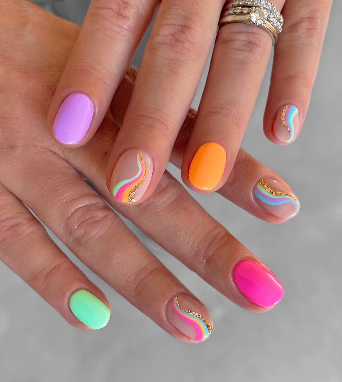 Neon skittles swirl nails