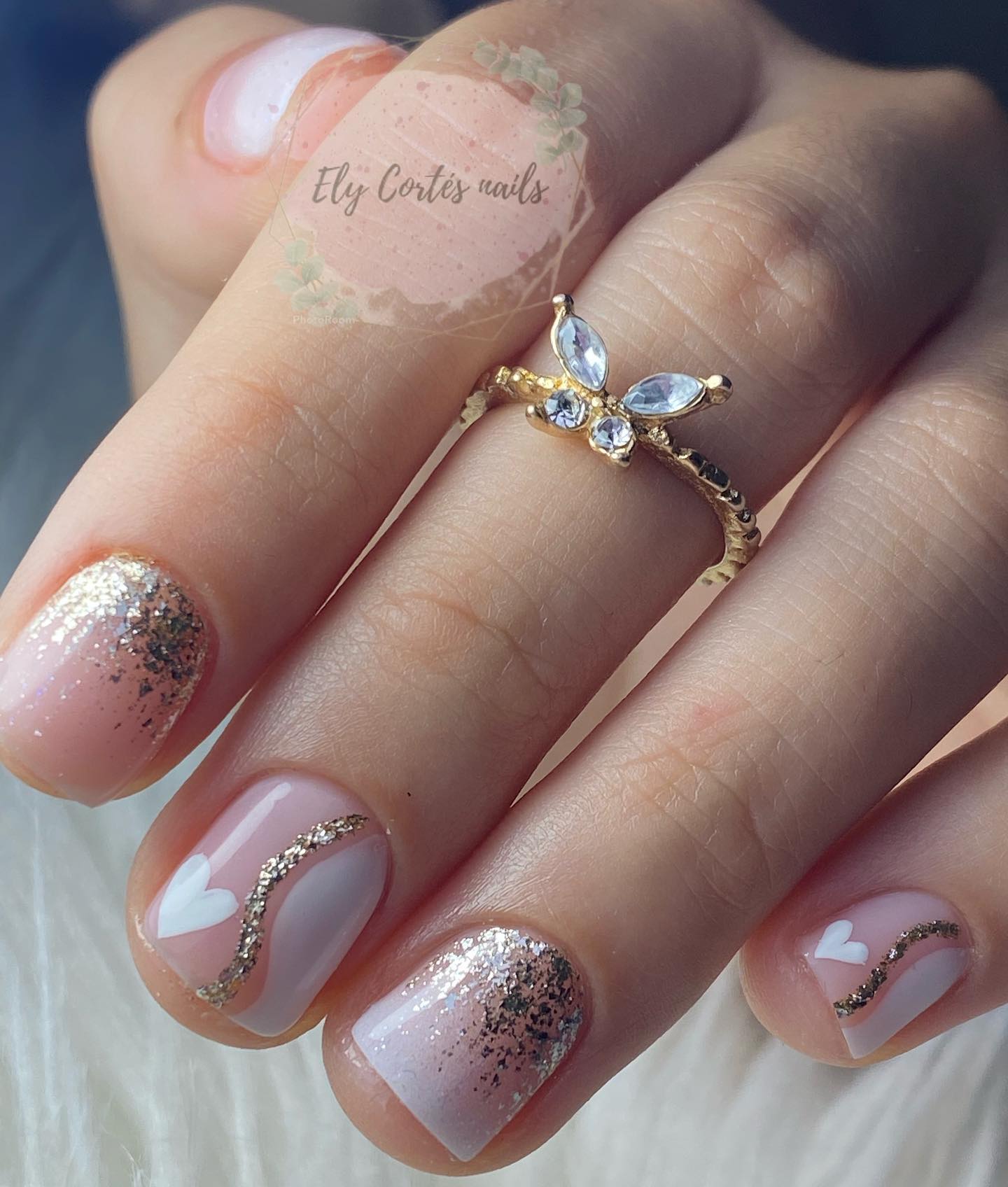 Nude gold glitter heart nails