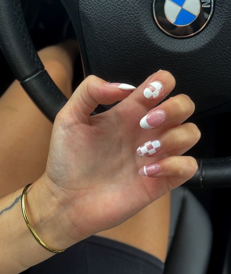Nude almond nails with white checkerboard and French tips