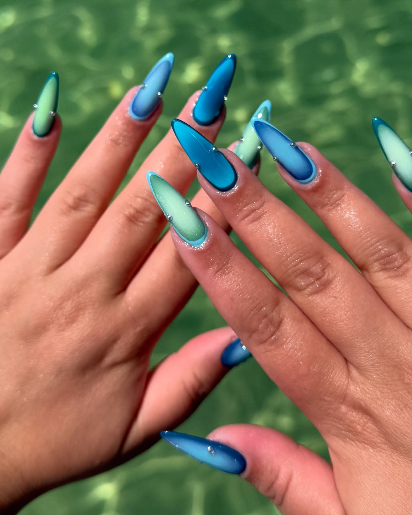 Pink chrome coffin nail extensions