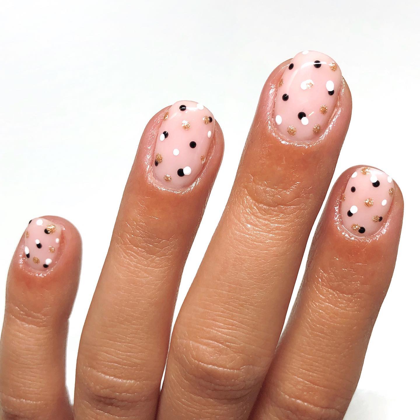 Pink polka dot nails