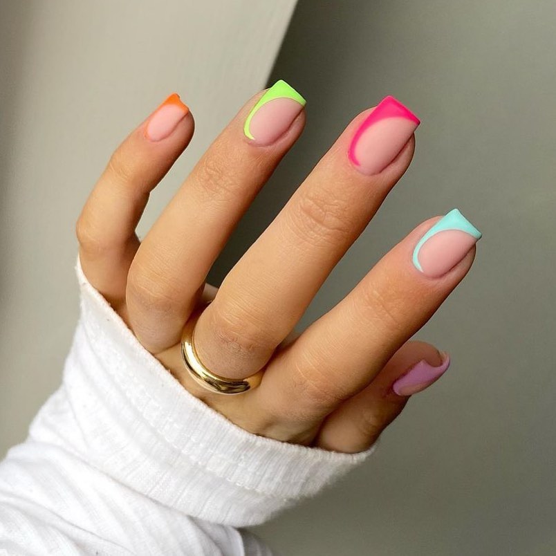 Short square nails with rainbow neon French tips