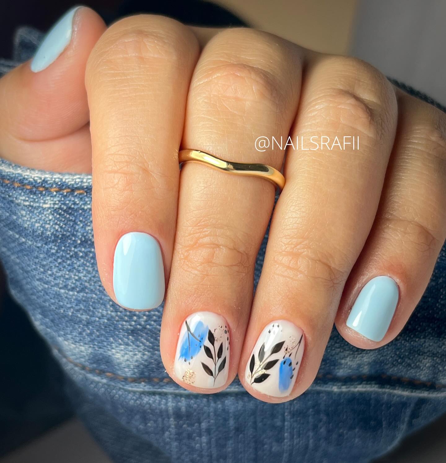 Sky blue botanical accent nails