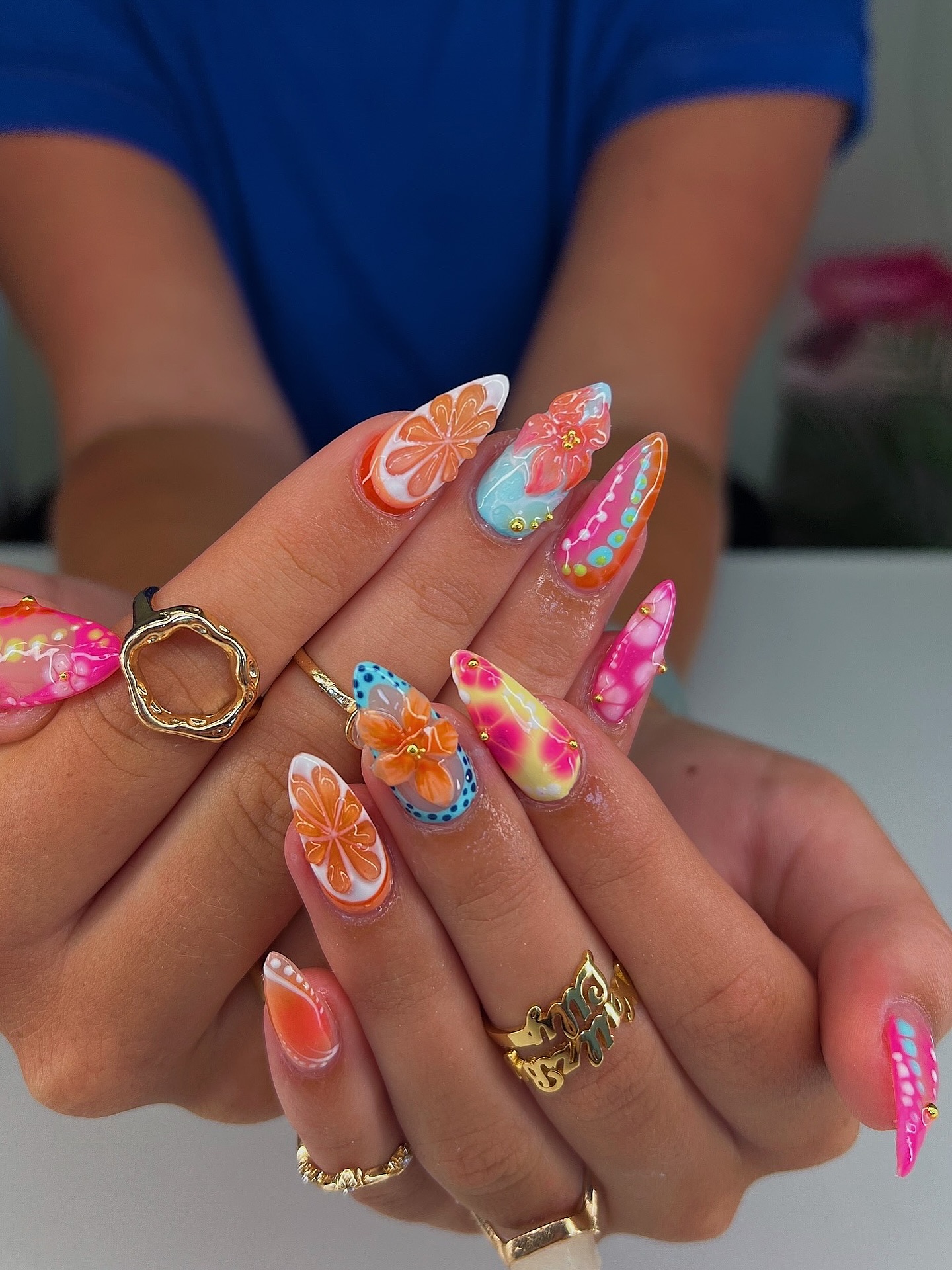 White nail extensions with 3D flowers