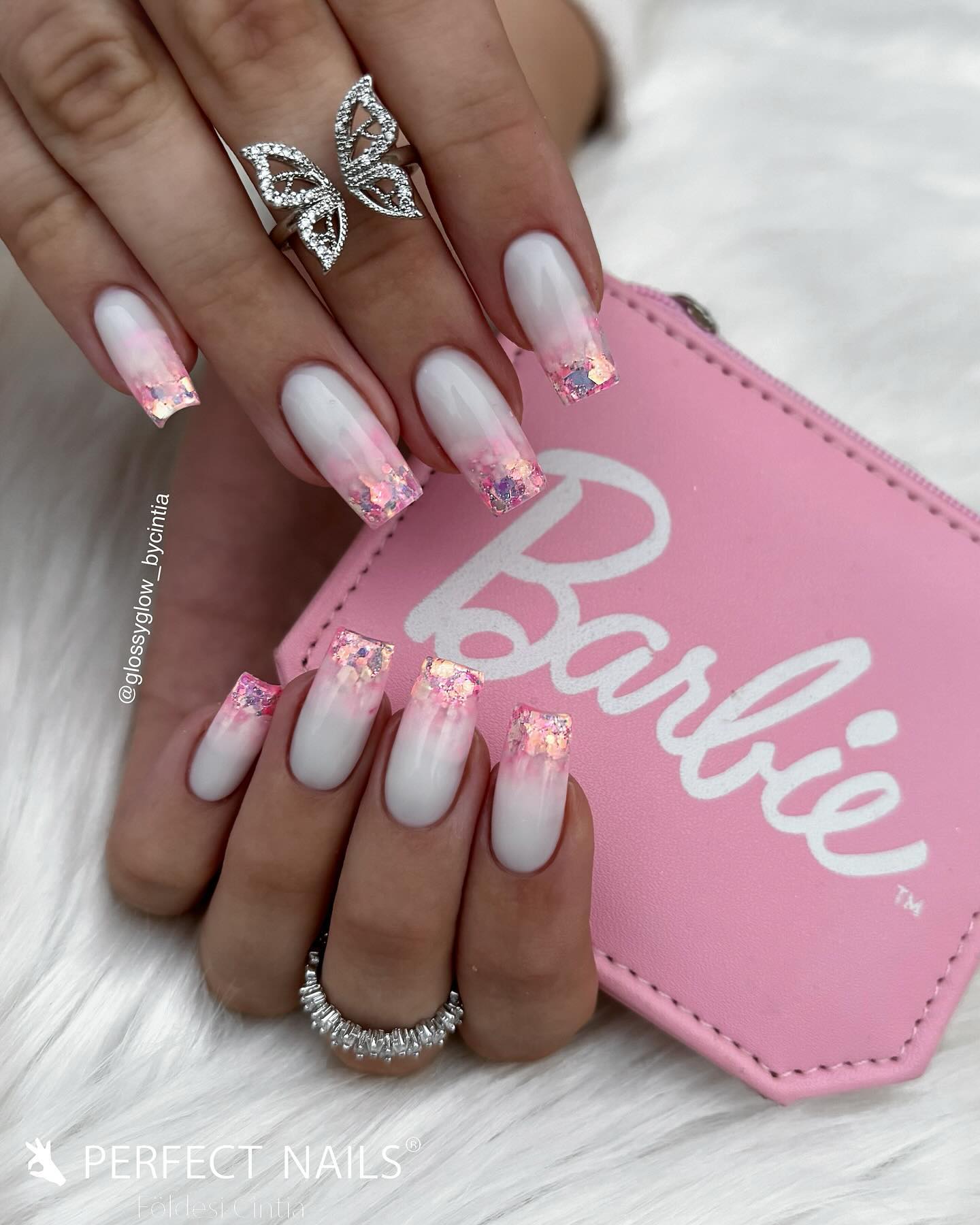 Long coffin nails in cloud white ombre with chunky iridescent pink glitter tips