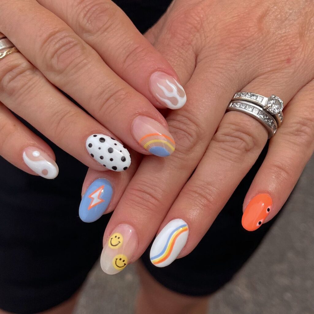 Sage Doodle Faces nails