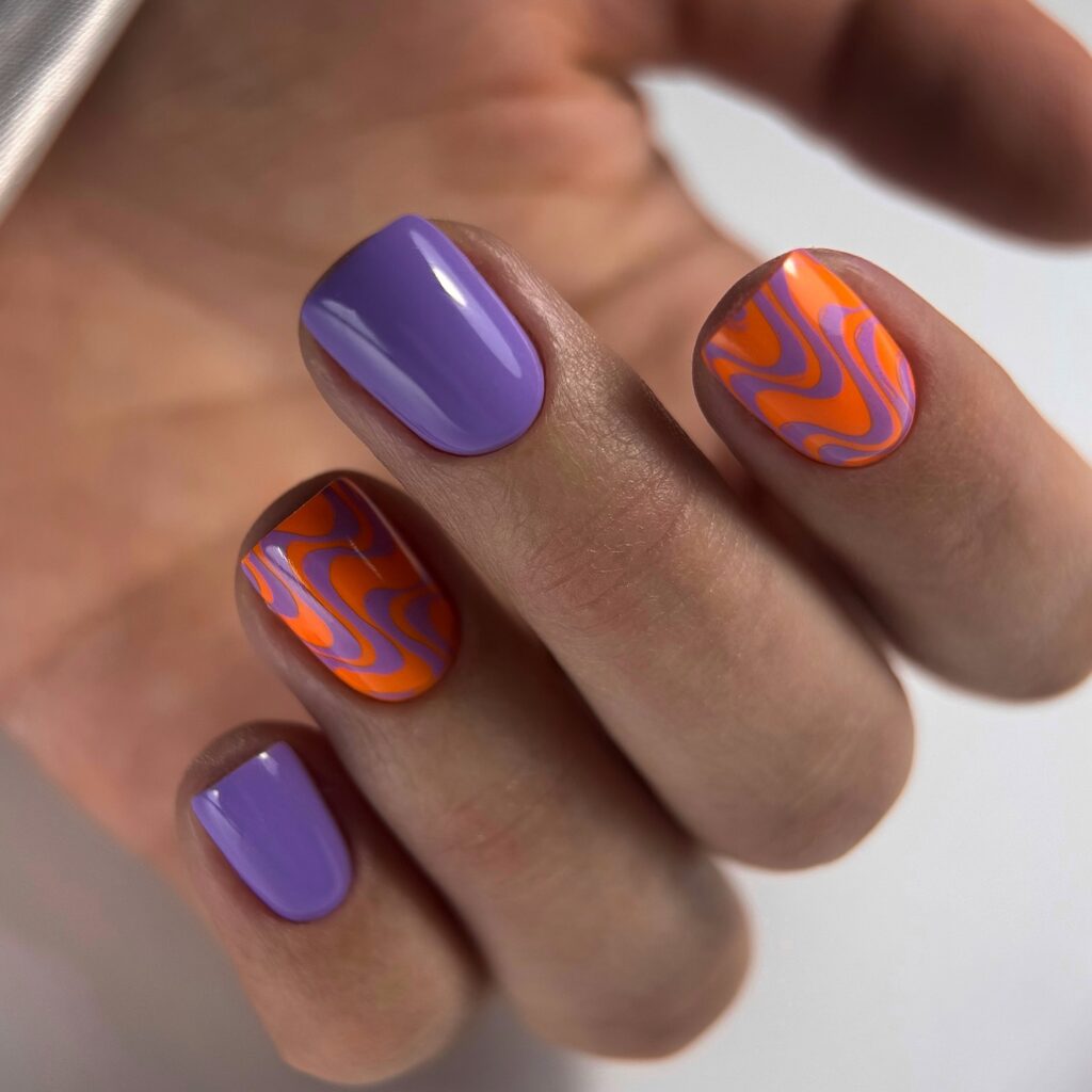 Violet & Orange Swirl nails