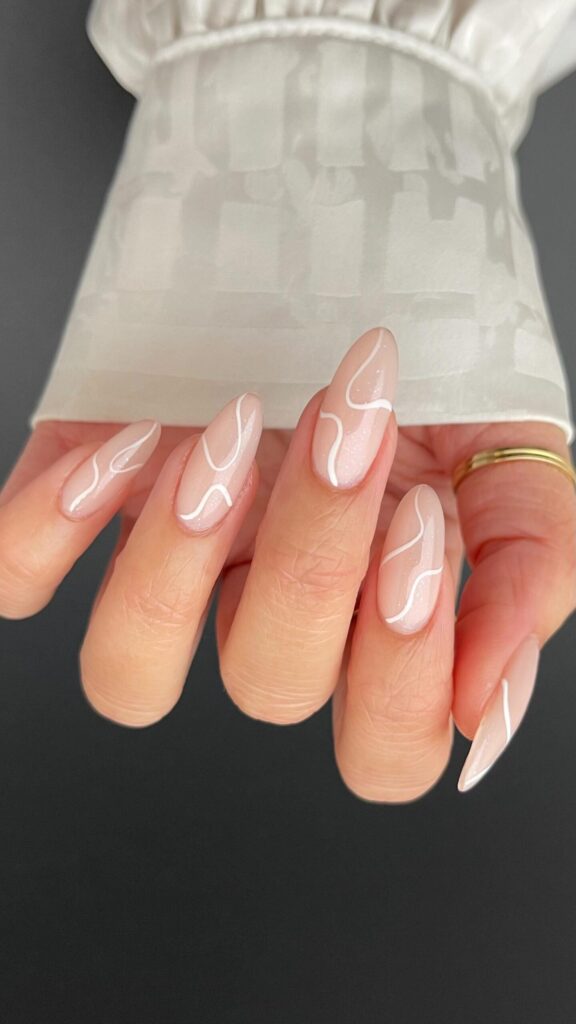 Milky Raised Swirls nails