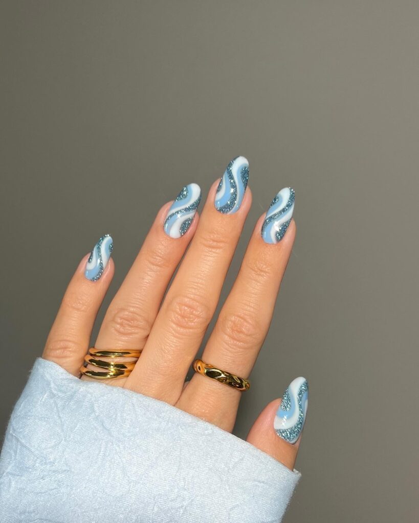 Icy Blue Glitter Waves nails