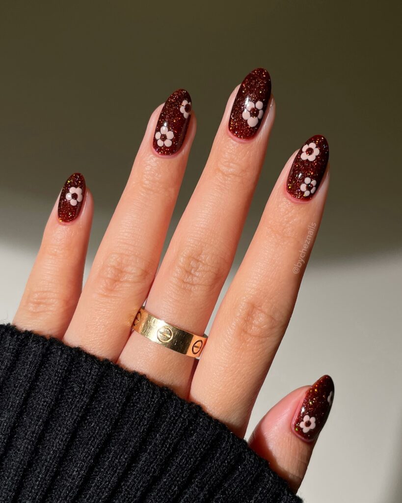 Burgundy Glitter Daisies nails