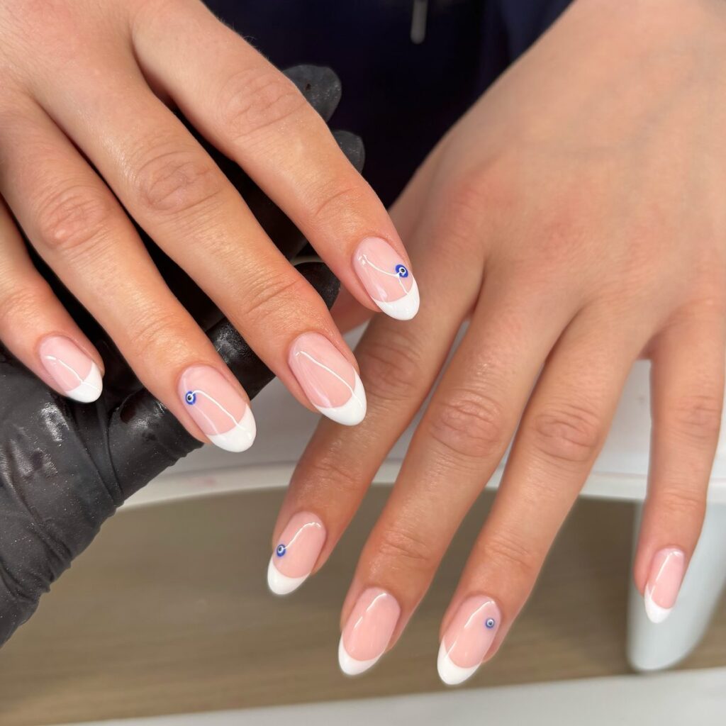 Minimal Evil Eye French nails