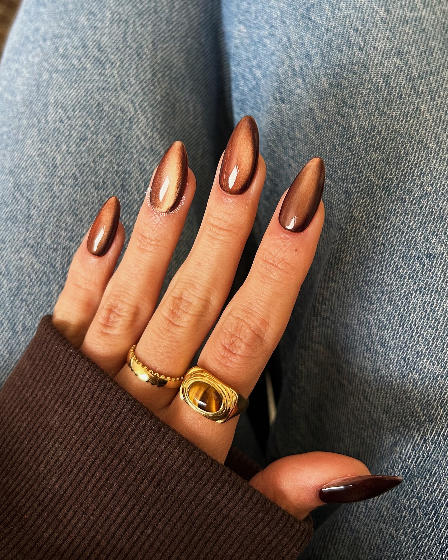 glossy brown cat eye nails
