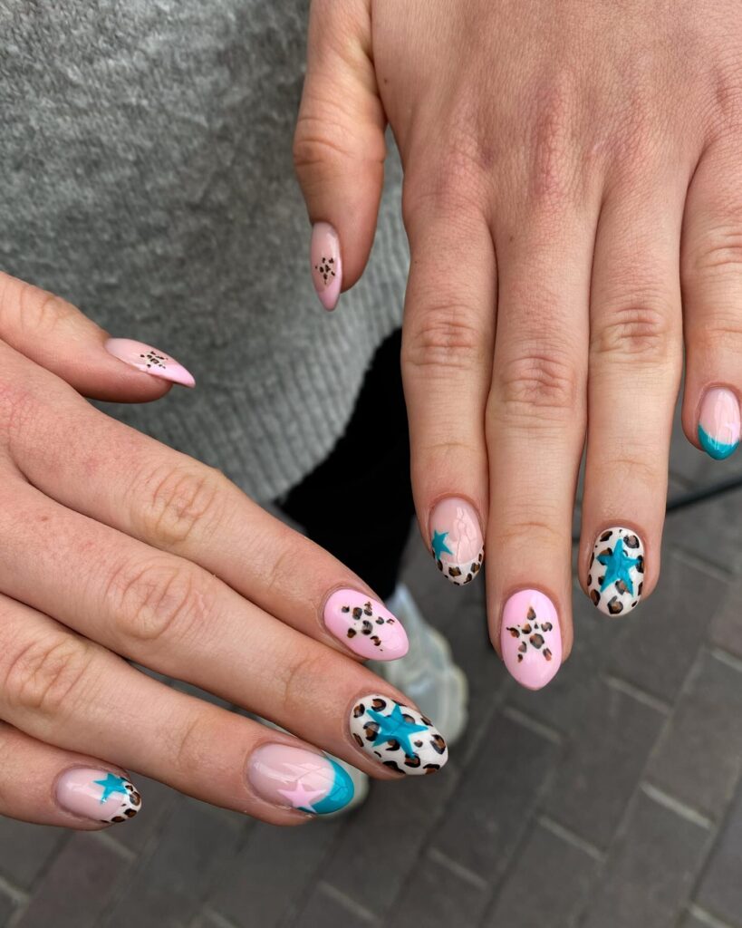 Teal Star Cheetah nails