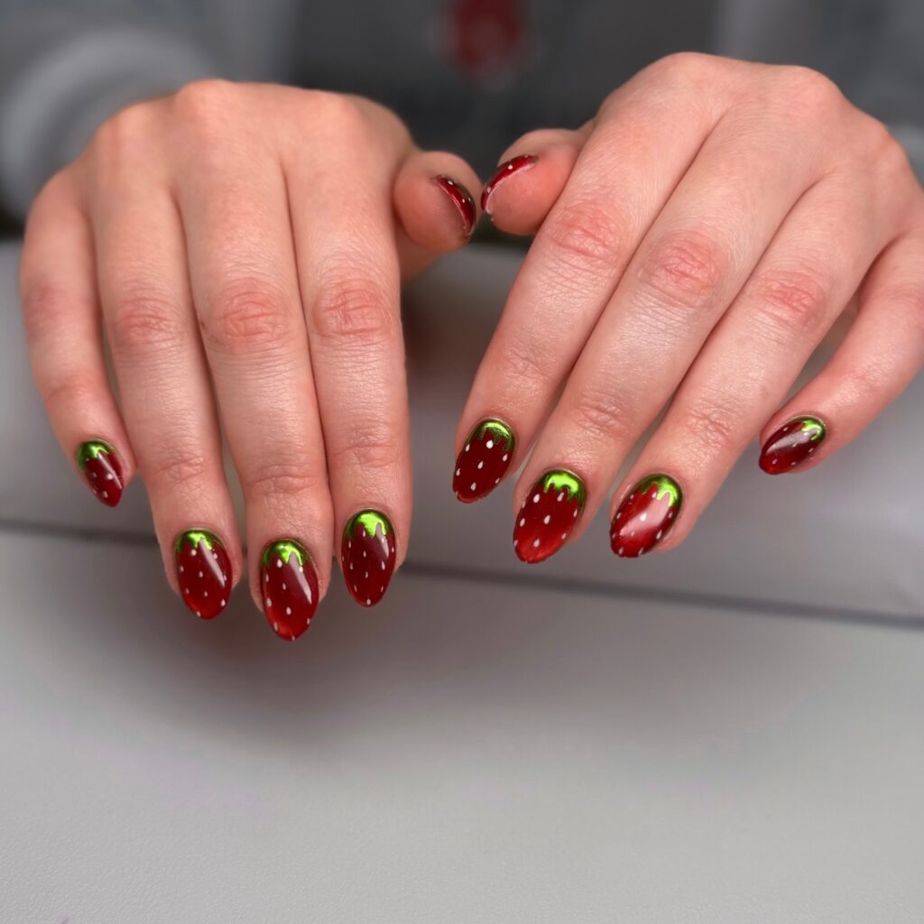 red and green strawberry nails