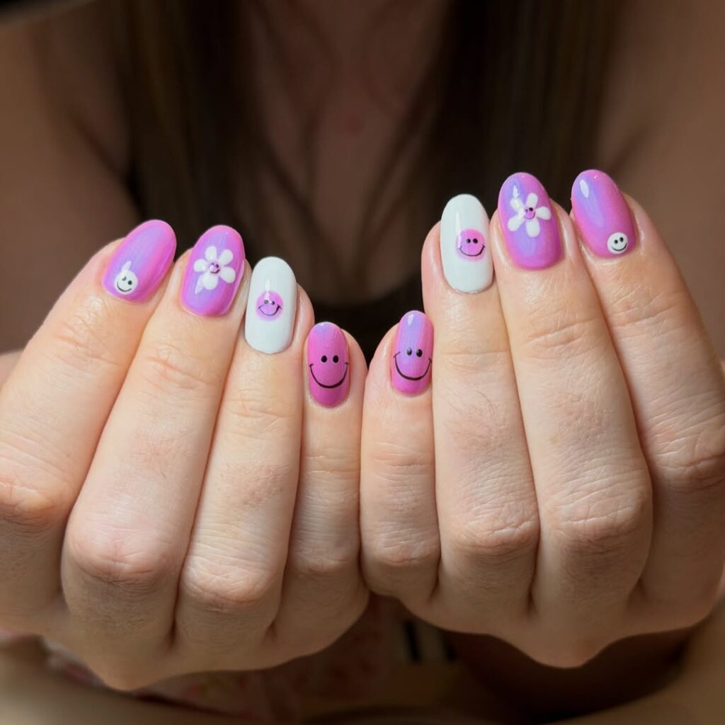 smiley face nails with white daisies