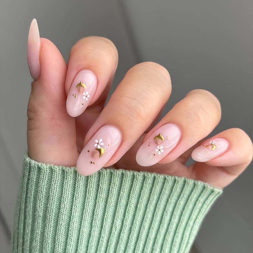 Soft Pink Almond Nails with Tiny Floral Details