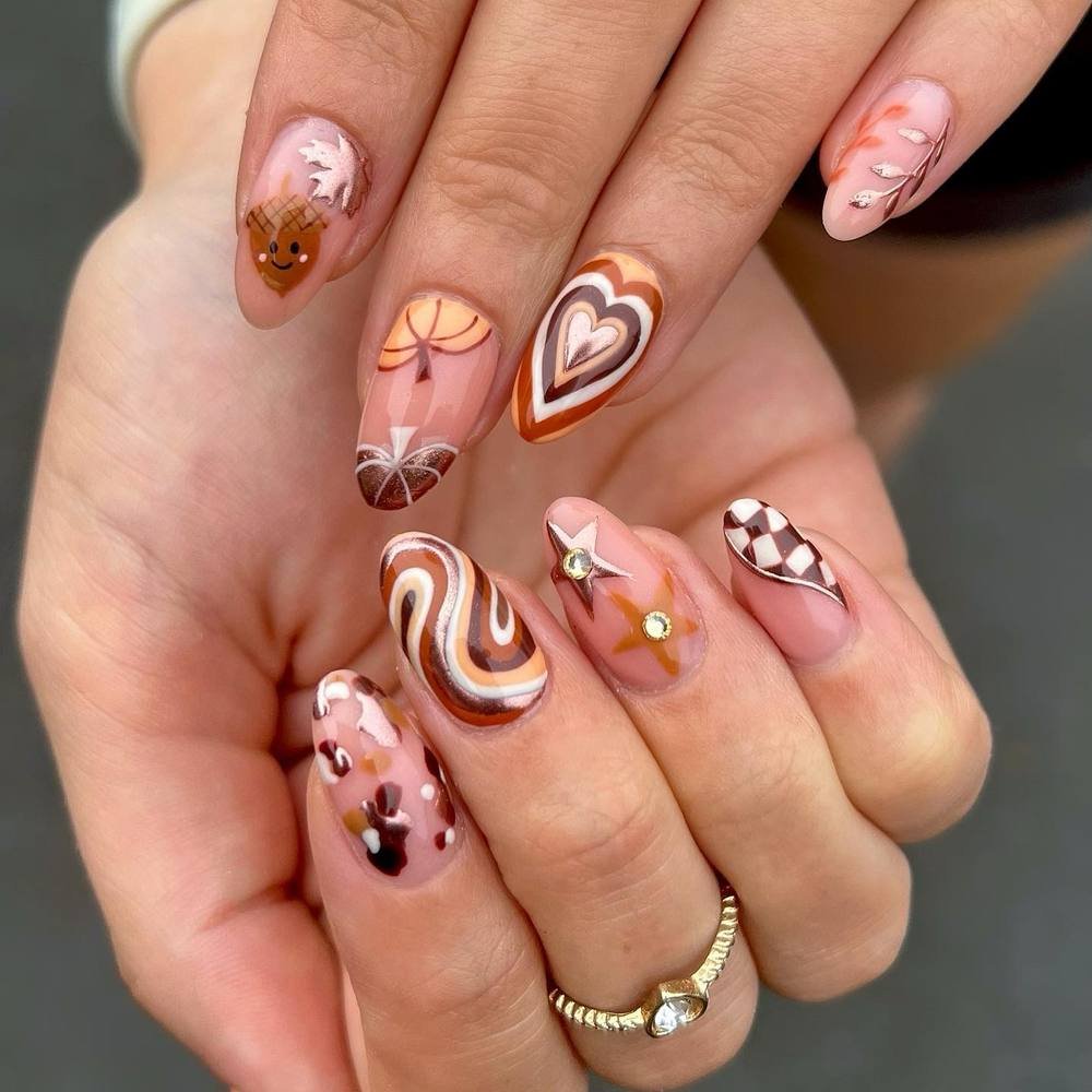 Pink Nails with Swirls, Hearts, and Autumn Accents