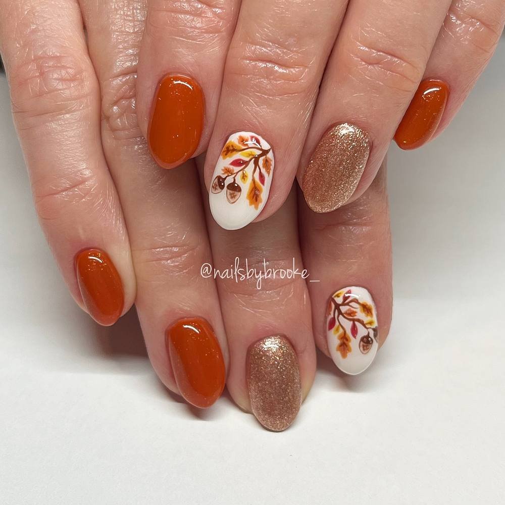 Burnt Orange and Glitter Brown Nails with Floral Accents