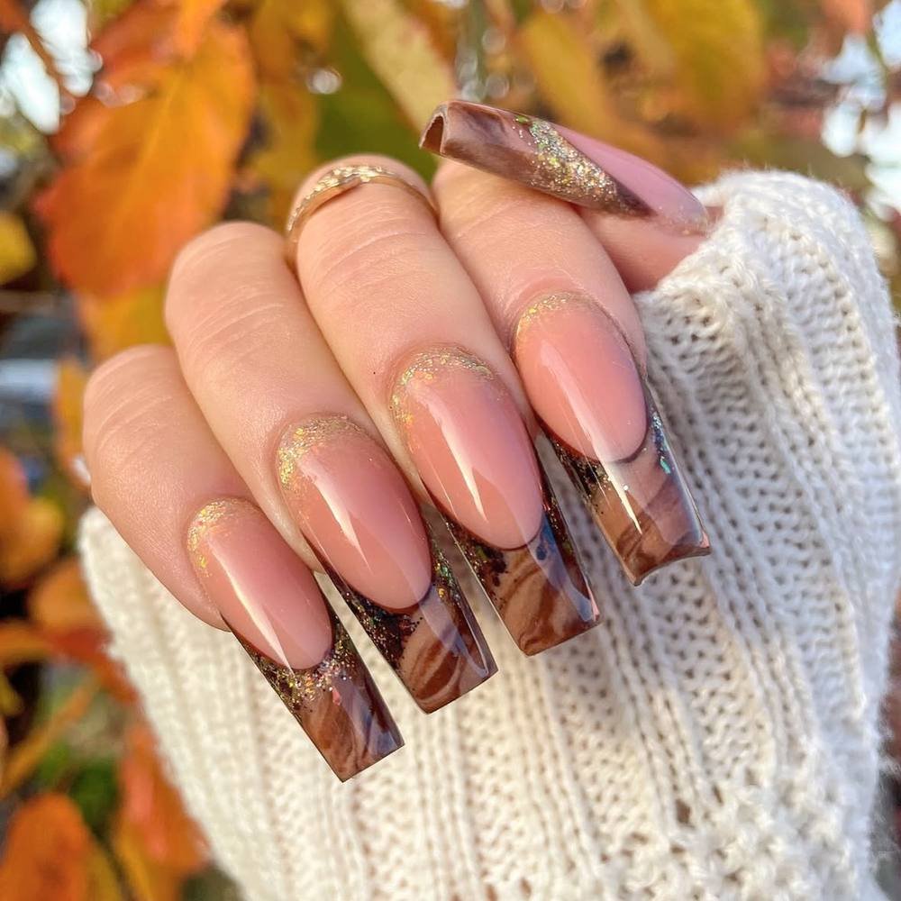 Pink Nude Nails with Clear Brown-Tipped Sections