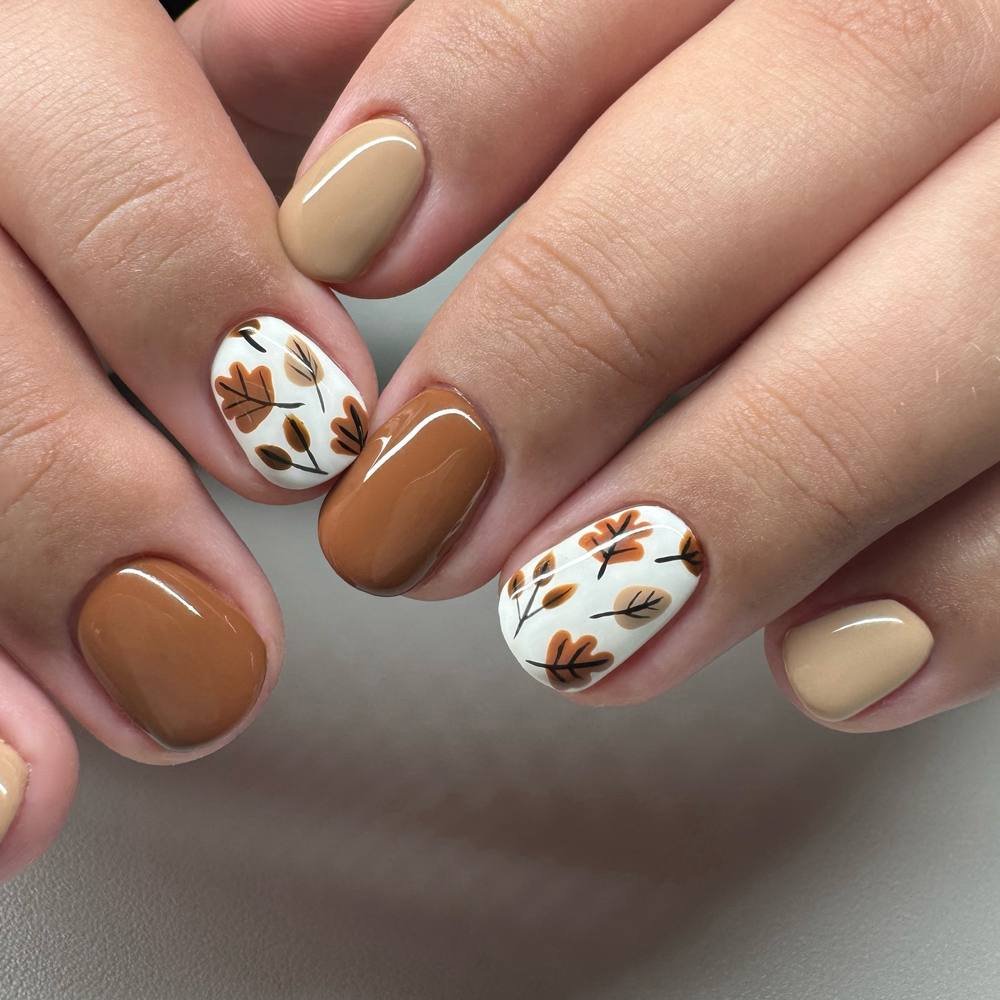 Tan, Brown, and Cream Nails with Leaf Illustrations