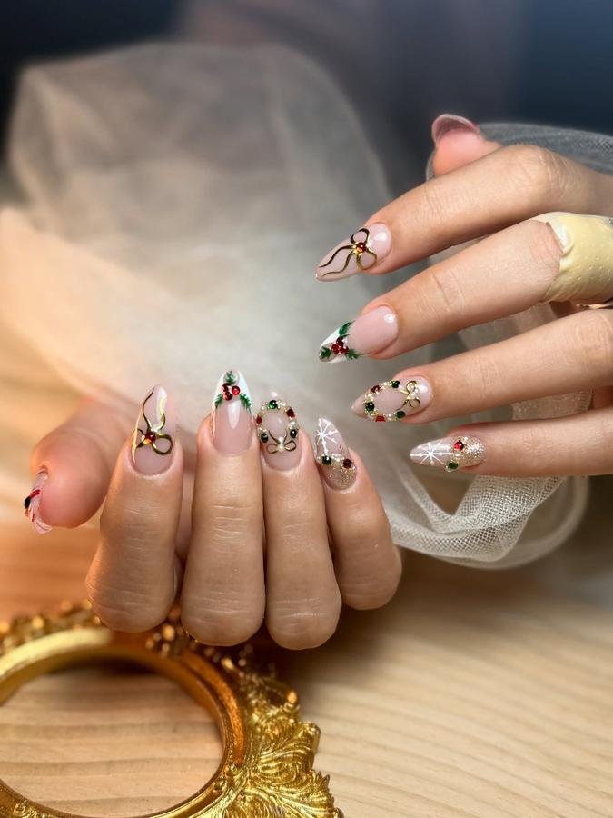 DSGy3TKj7DV — Sheer Pink Christmas Almond Nails with Tiny Green and Red Accents