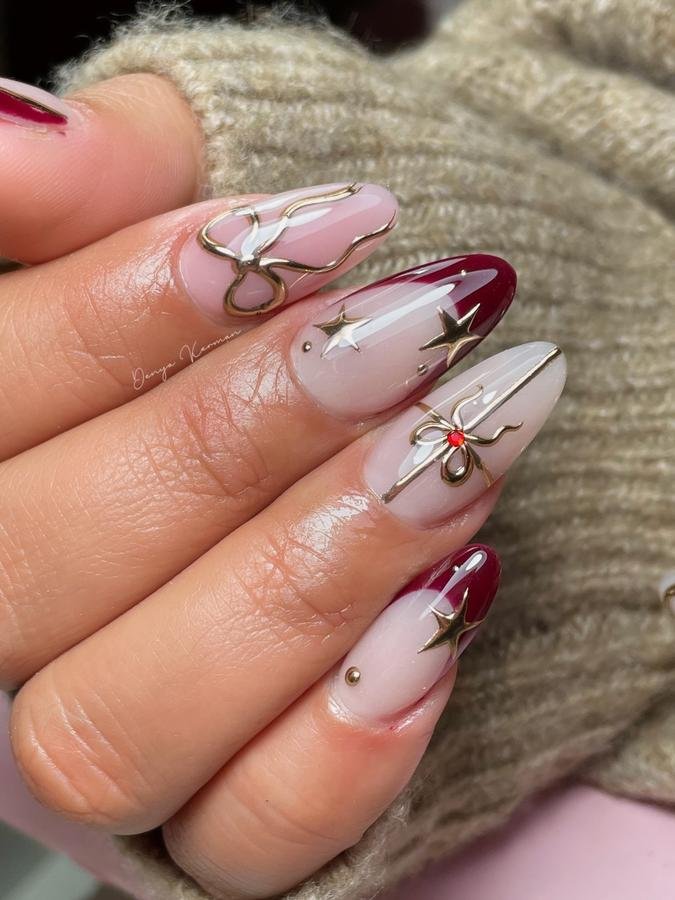 DSXthlQkY_mDENYA KERMAN — Pink and Burgundy Starburst Almond Nails with Metallic Details