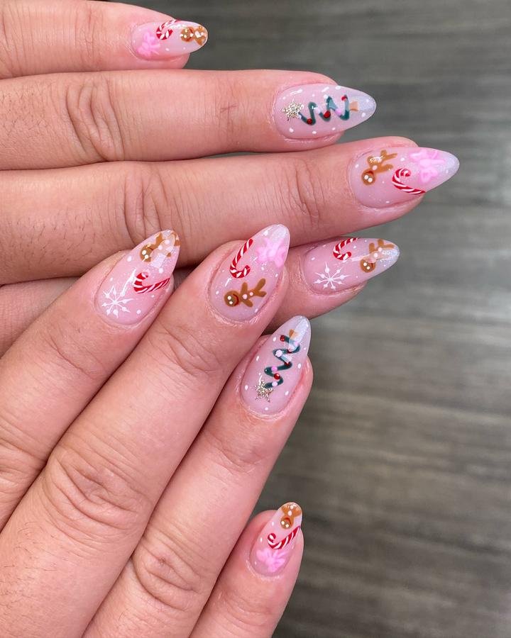 C0iLnipLmx7Ny Kuin Lyu — Pink Christmas Almond Nails with Candy Canes and Tiny Charms