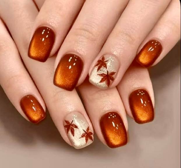 Cinnamon brown nails with autumn leaf accents