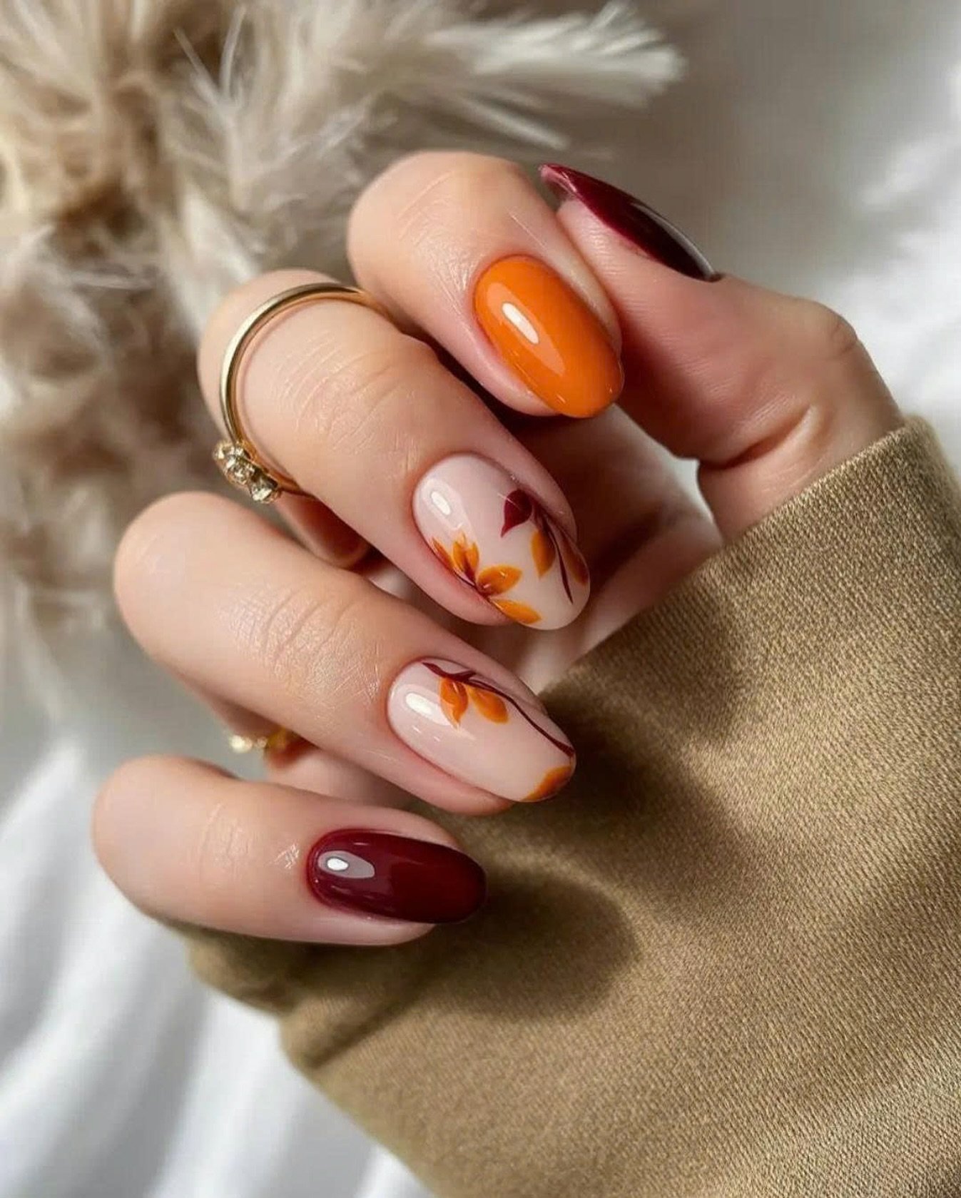 Warm orange and burgundy autumn almond nails
