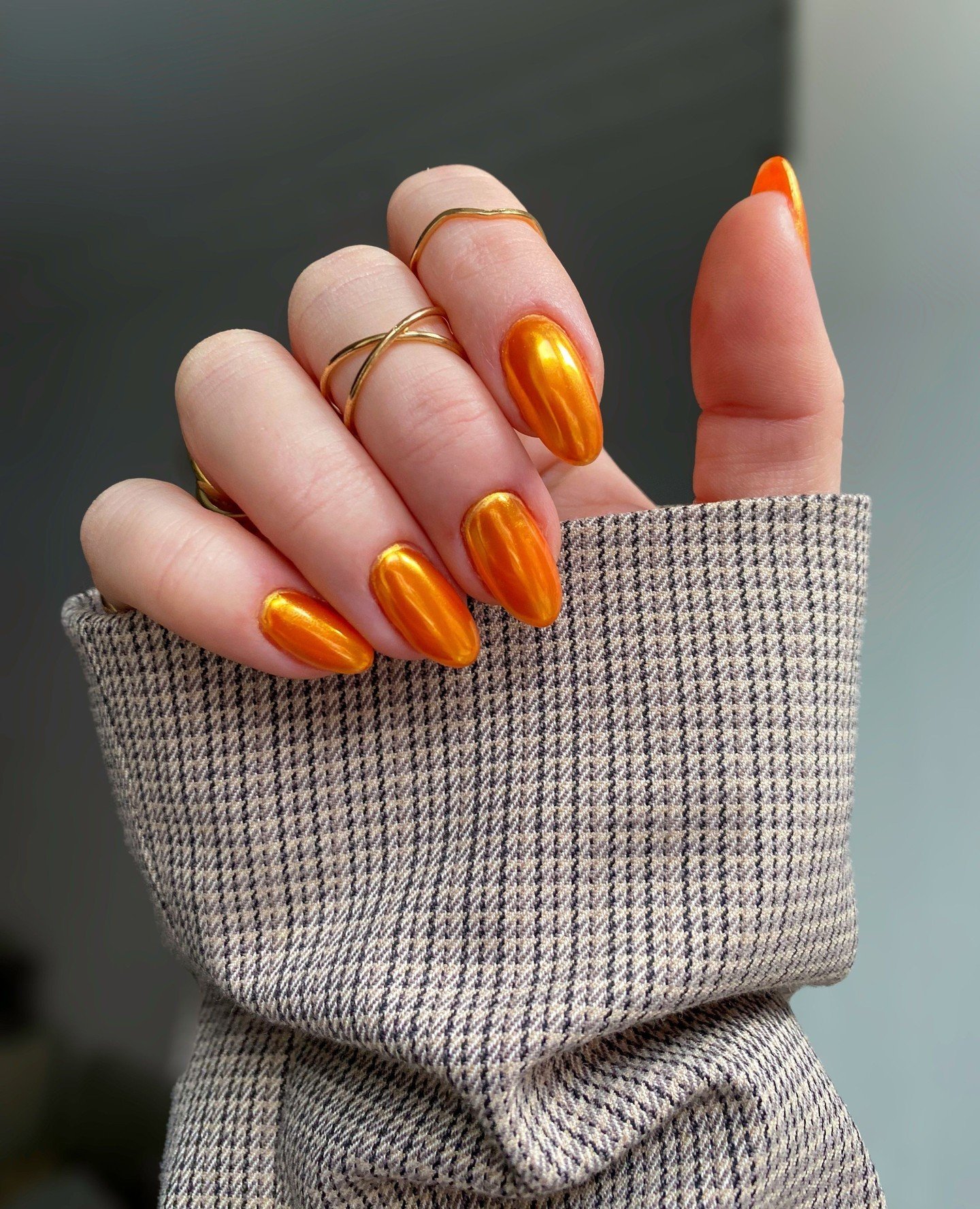 Metallic Orange Almond Nails