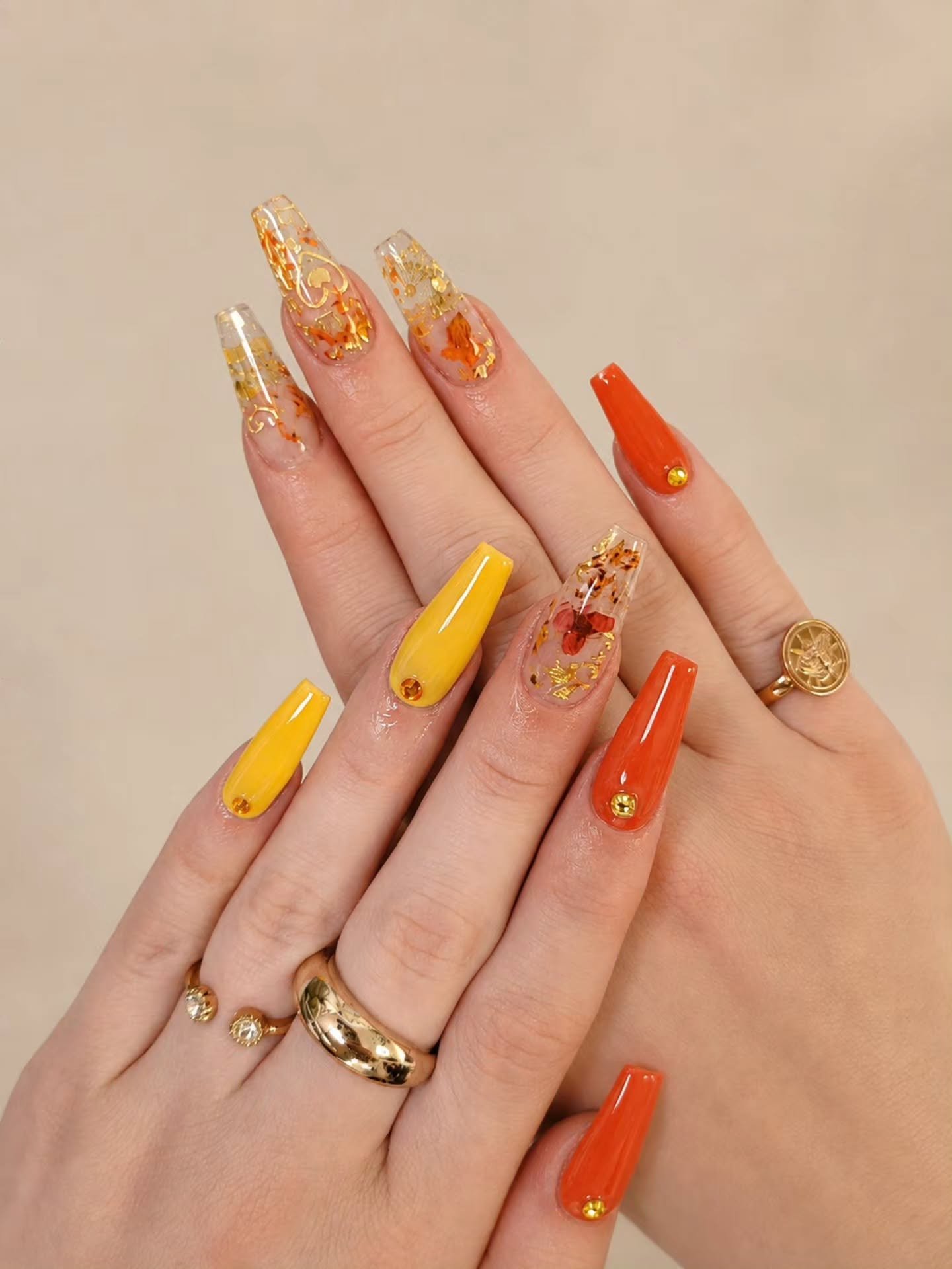 Yellow, Orange and Embellished Long Nails