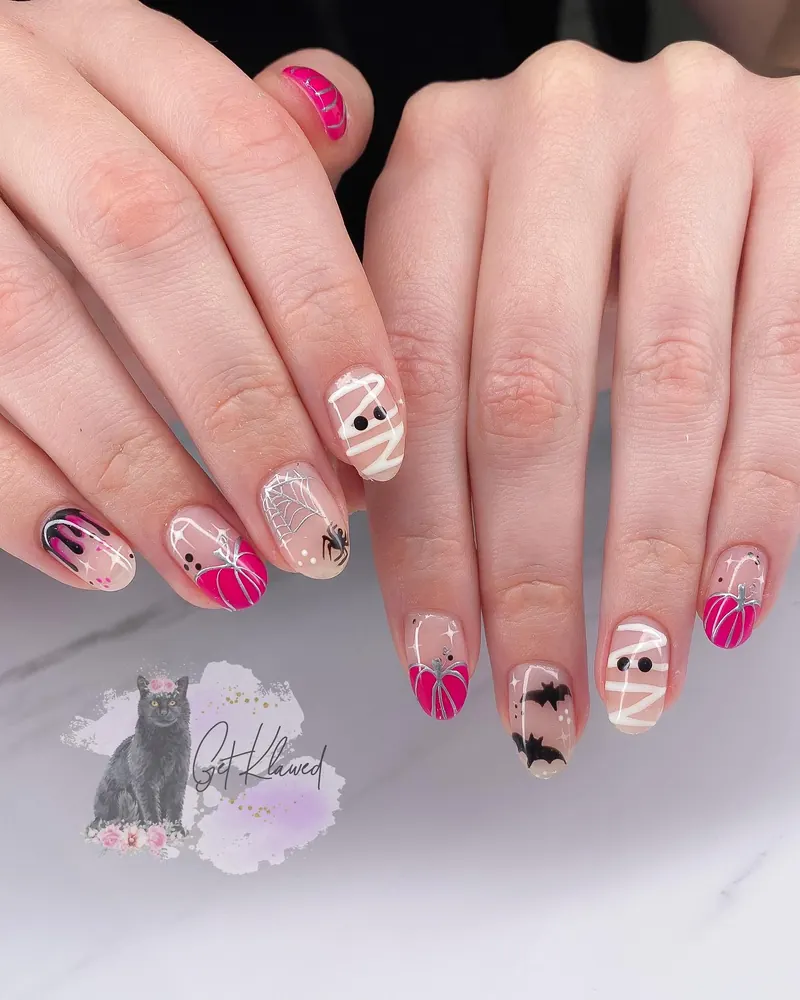 Soft Pink Halloween Nails with Small Bat Details